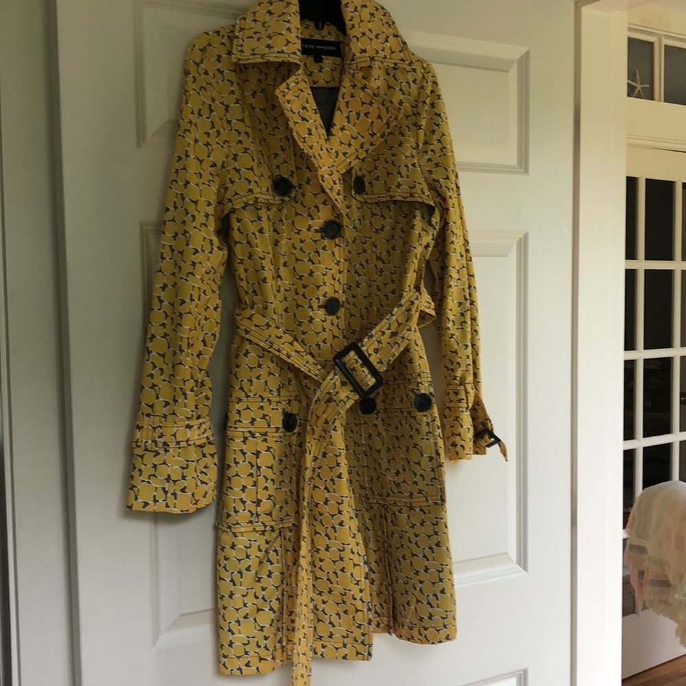 Purchased about 10 years ago and worn 1-2 times. Perfect condition. Runs small.